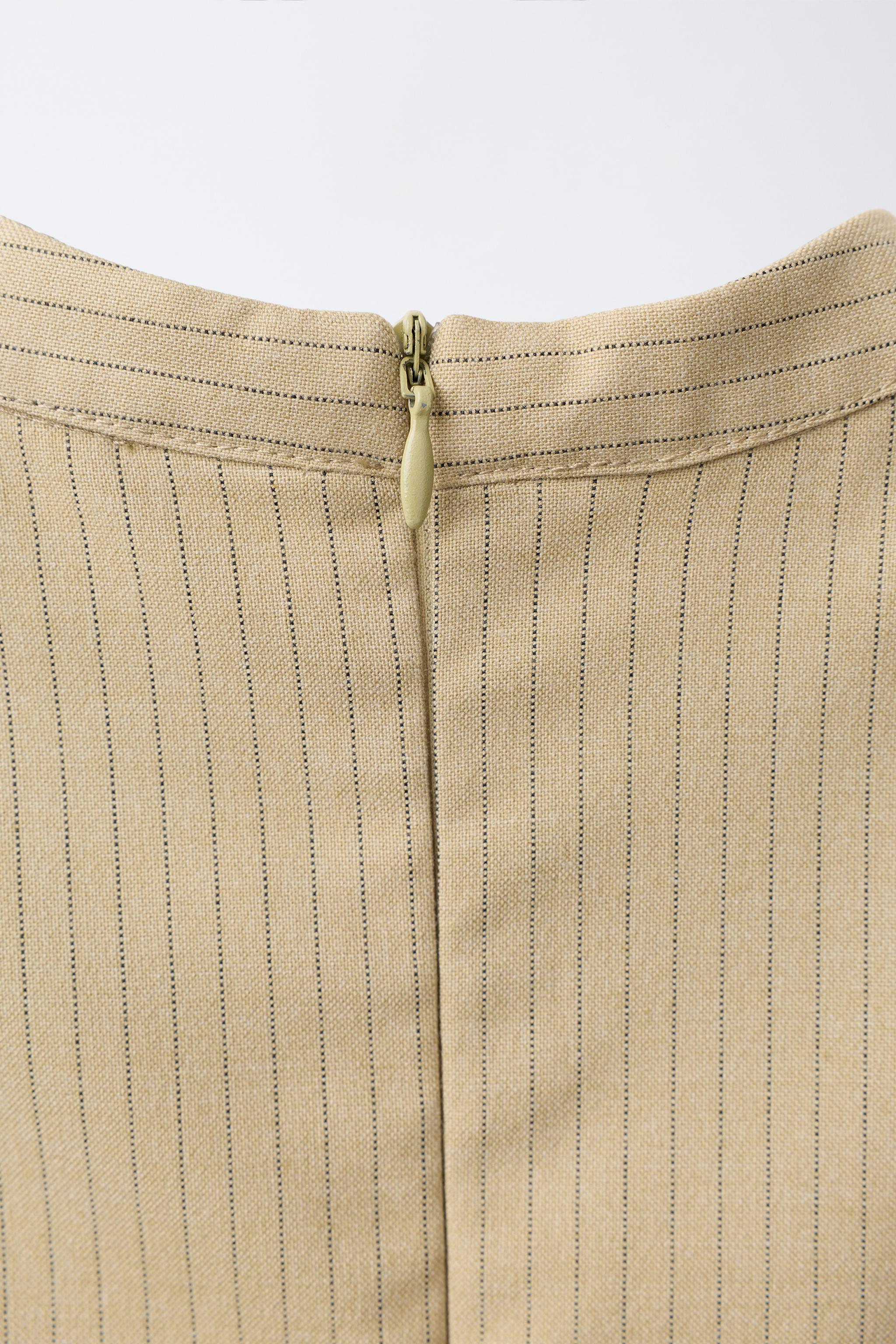 STRIPED DRESS WITH FROG FASTENINGS